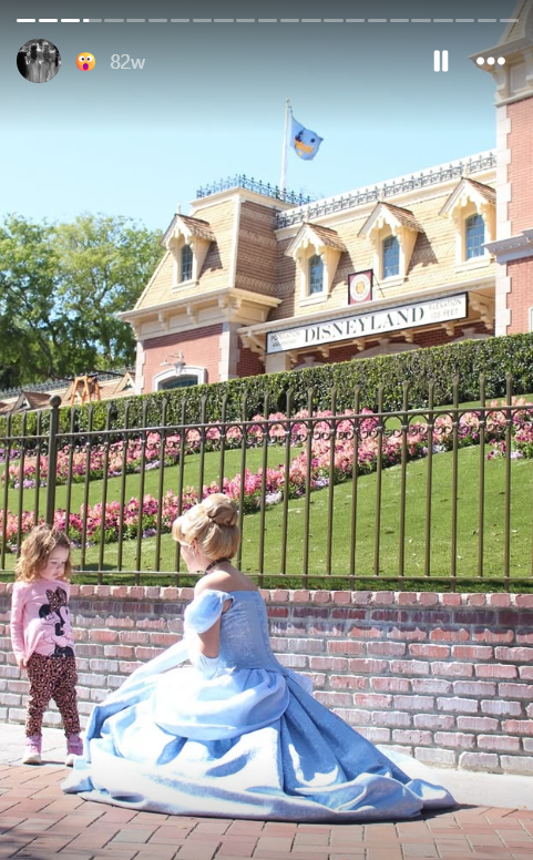 Avery Lynch as Cinderella interacting with a young guest at Disneyland, as shared on Instagram Story | Source: Instagram.com/averyxmay